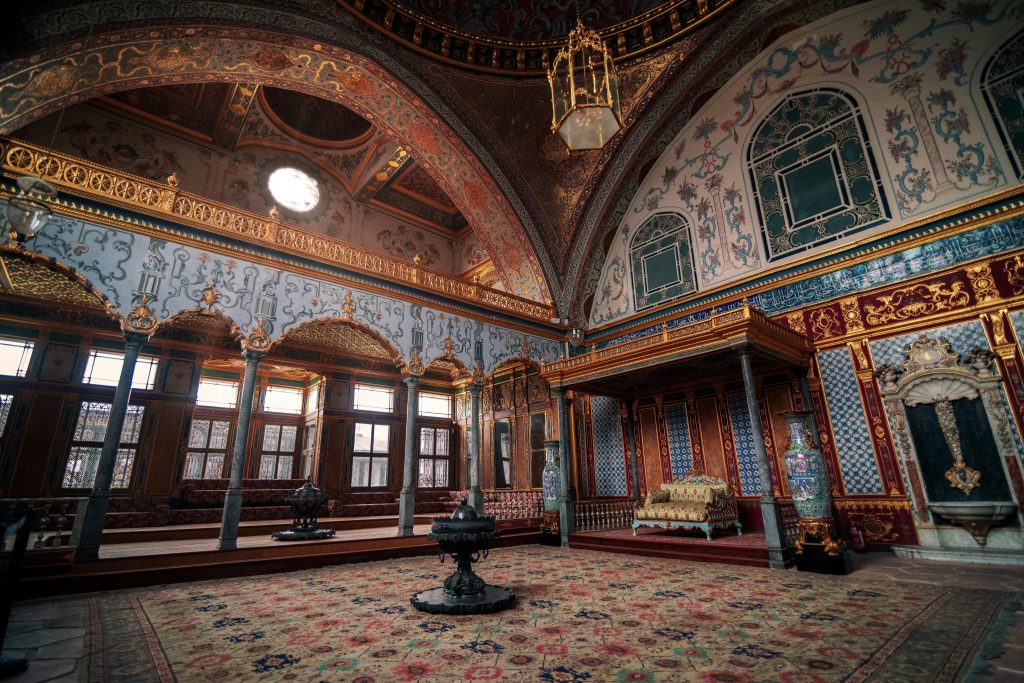 Explore the lavish and ornate interior of Topkapi Palace, featuring intricate designs and rich history.