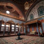Explore the lavish and ornate interior of Topkapi Palace, featuring intricate designs and rich history.